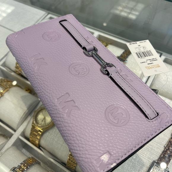 Michael Kors Handbags - MICHAEL KORS Carson Large Logo Debossed Snap Wallet
Light Quartz 
NWT